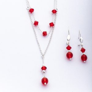 Conjunto collar doble y aros aretes piedras color rojo Brilho